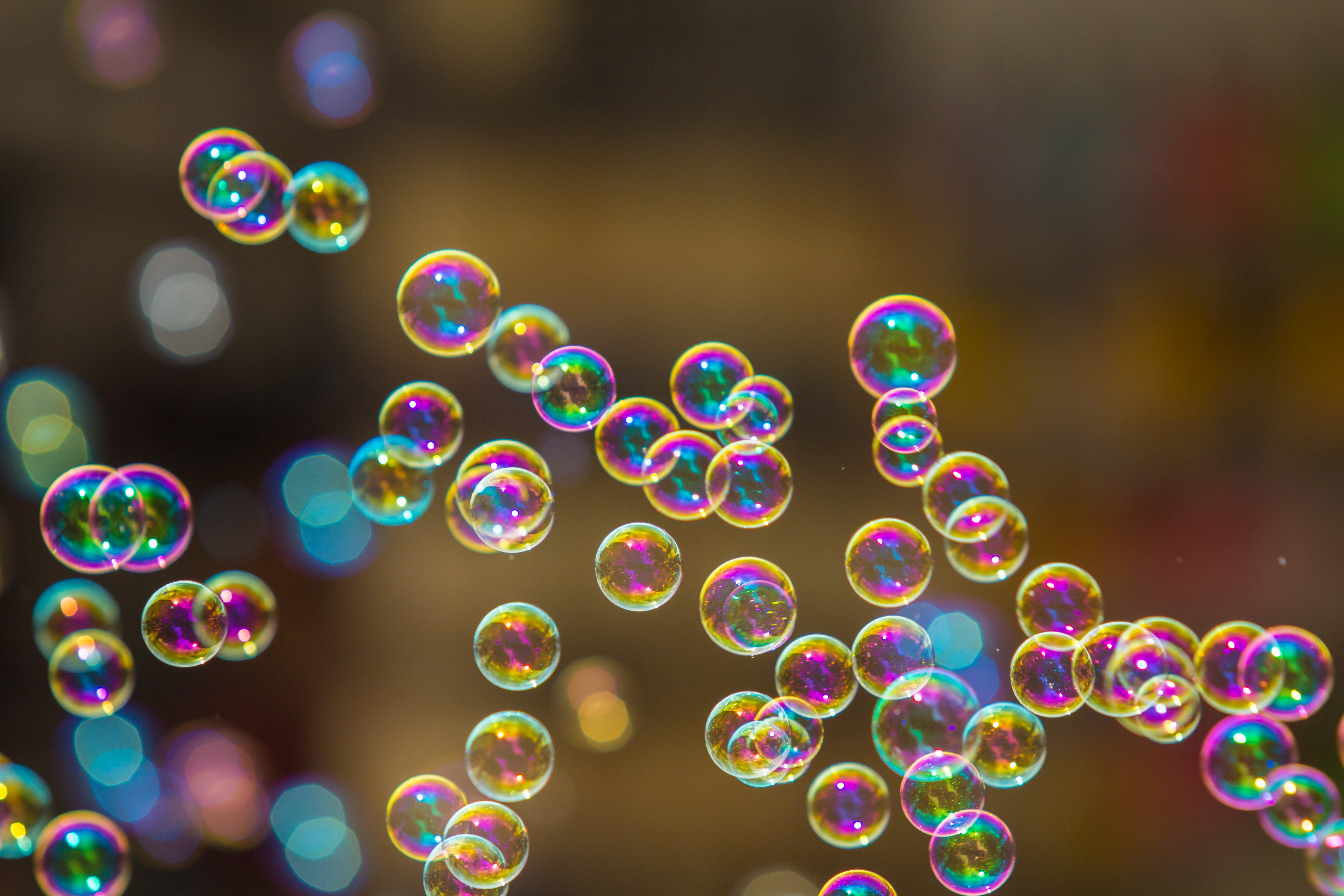 The rainbow soap bubbles from the bubble blower.